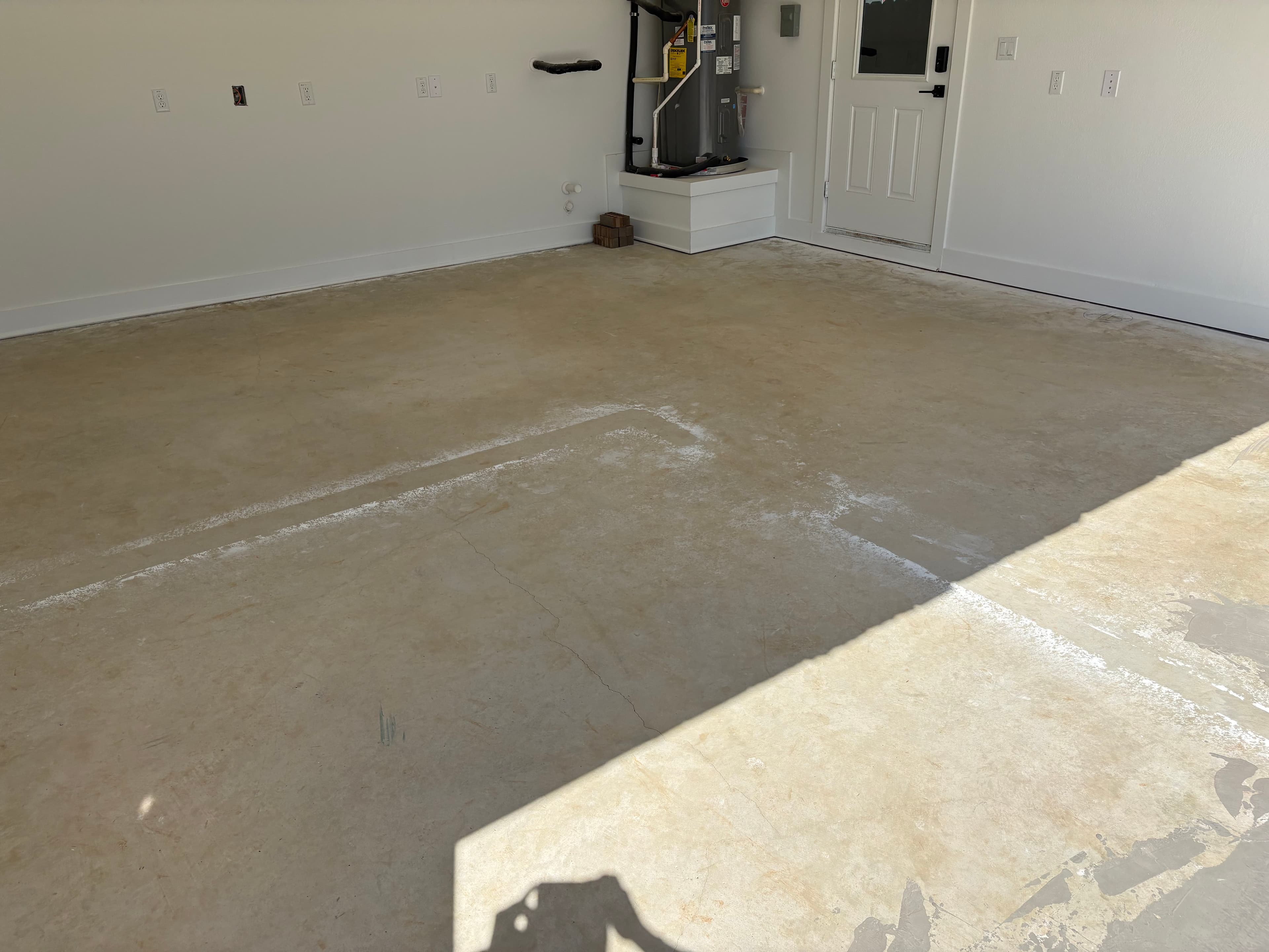 Garage walls freshly painted and prepped for transformation by My Ultimate Garage