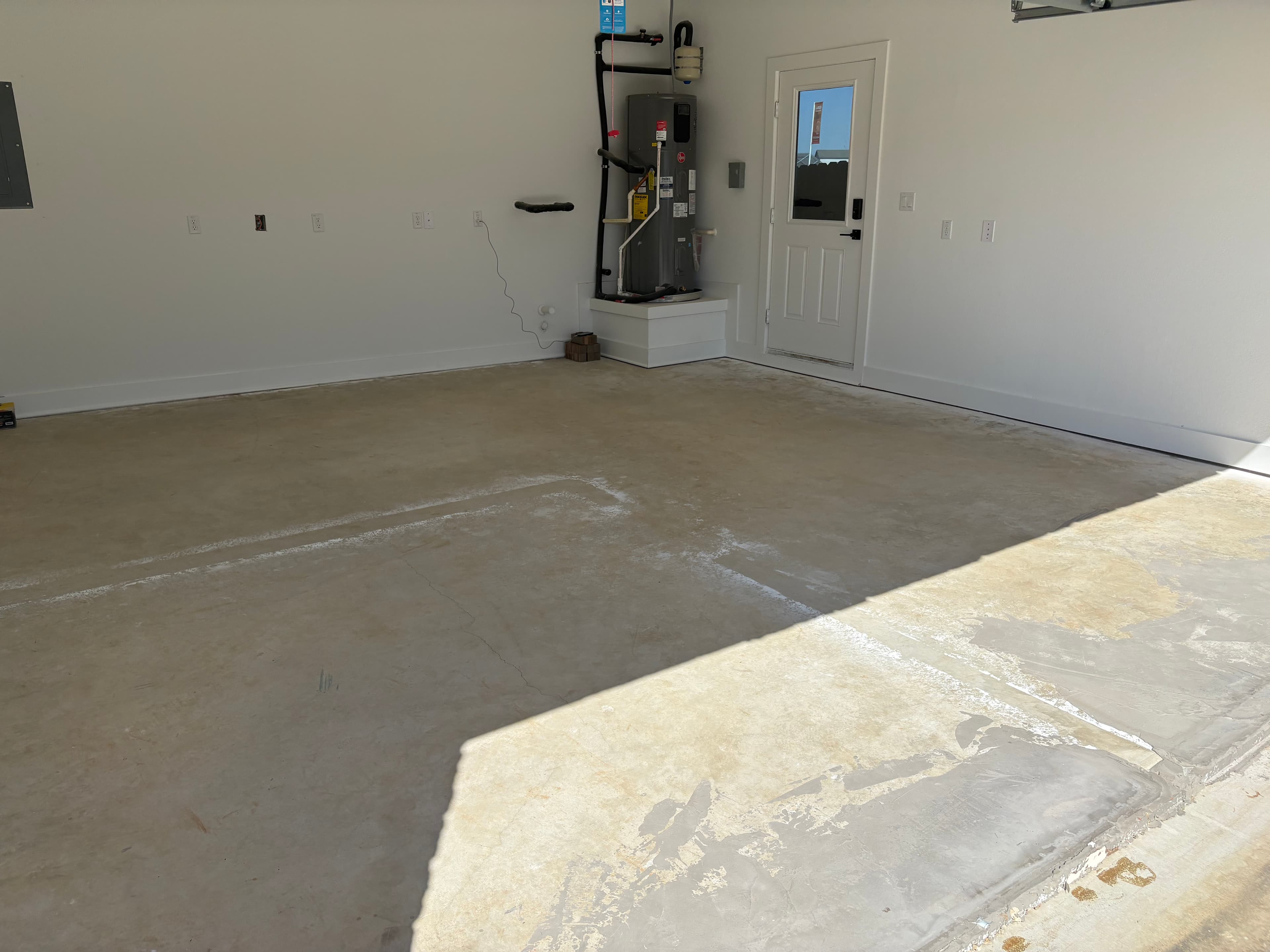 Empty garage space ready for home gym setup by My Ultimate Garage Austin TX