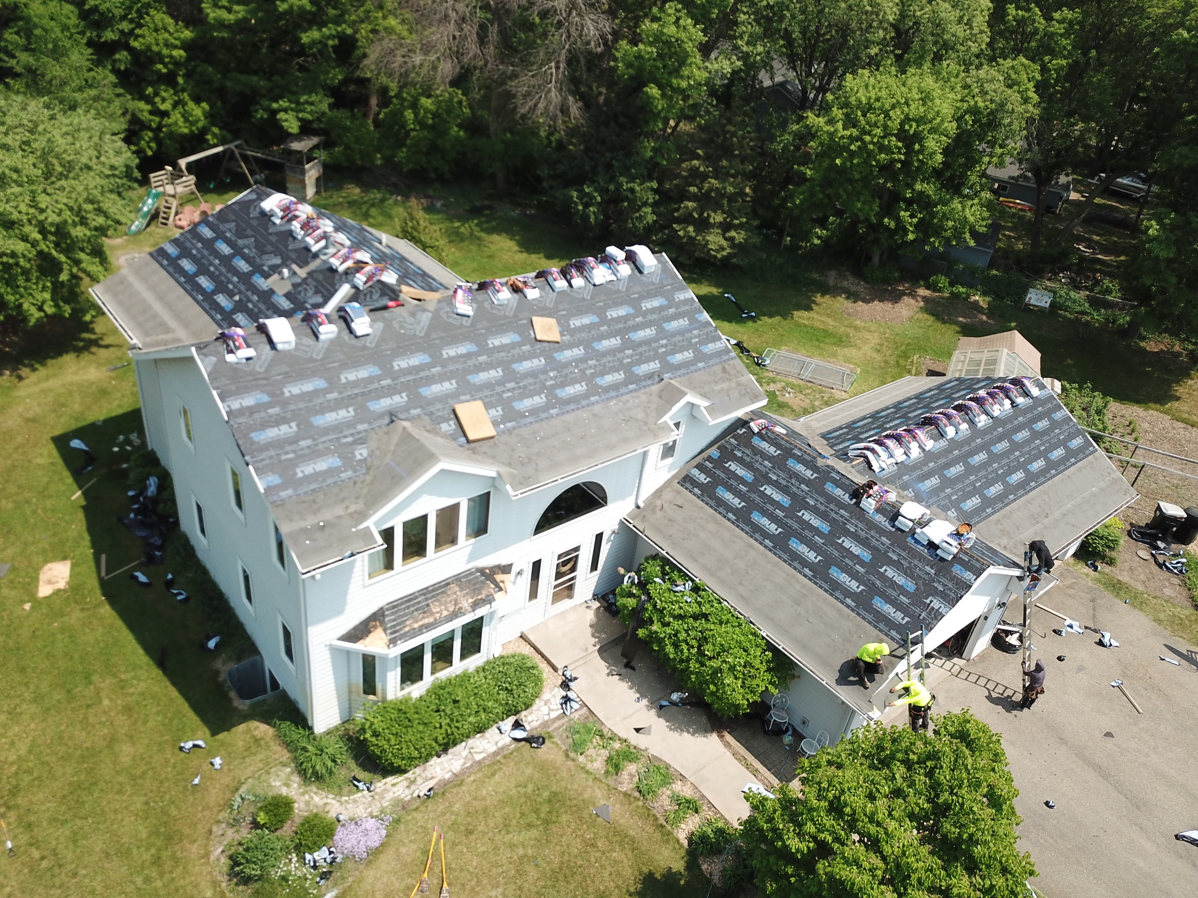 Two-car garage transformation with floor and storage by My Ultimate Garage